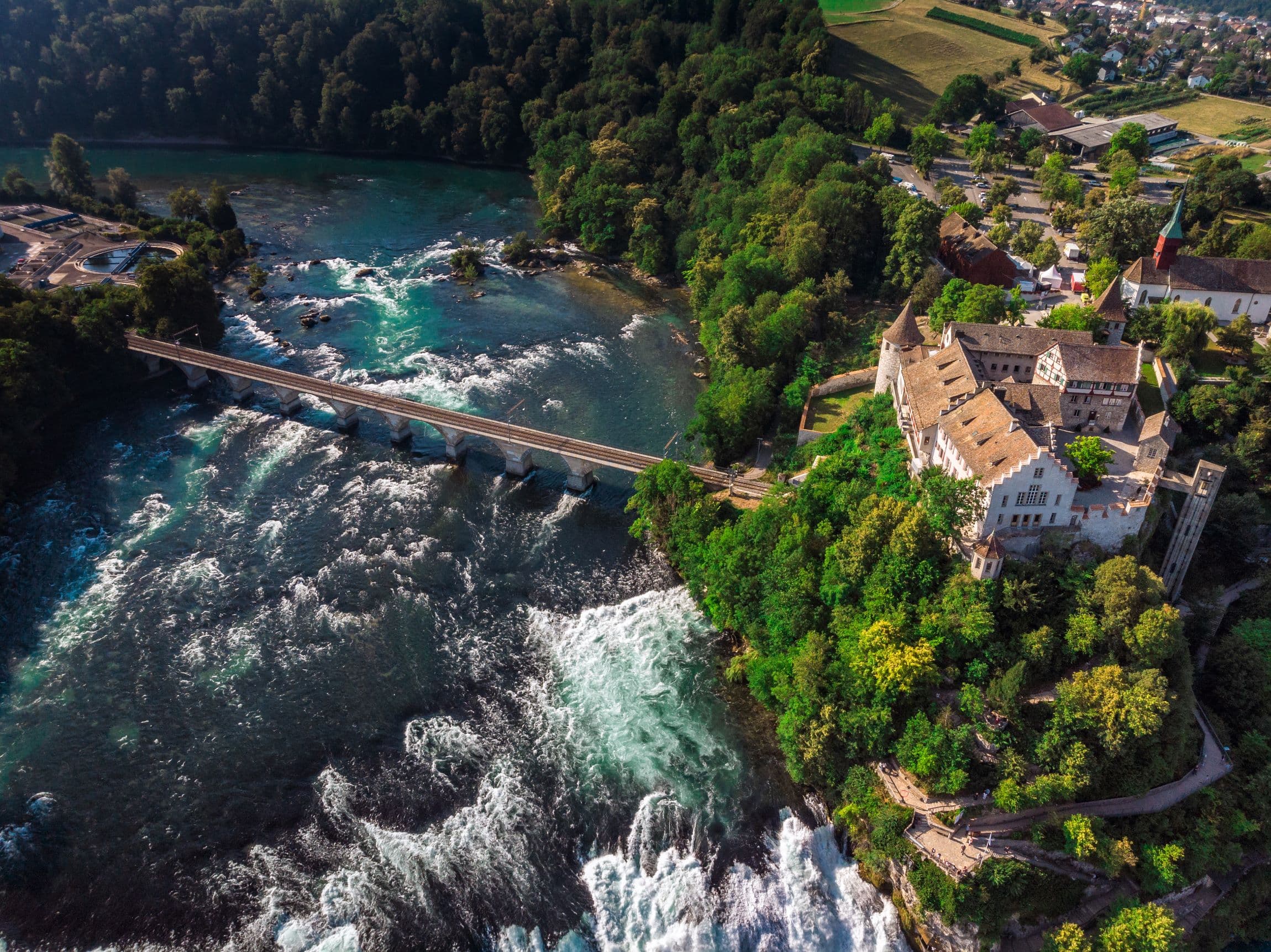 Aerial view of Rhine Falls Zurich with Laufen Castle and stone bridge over the river